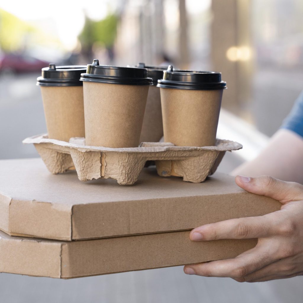 man t shirt delivering takeaway food